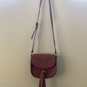 Brown tasseled bag